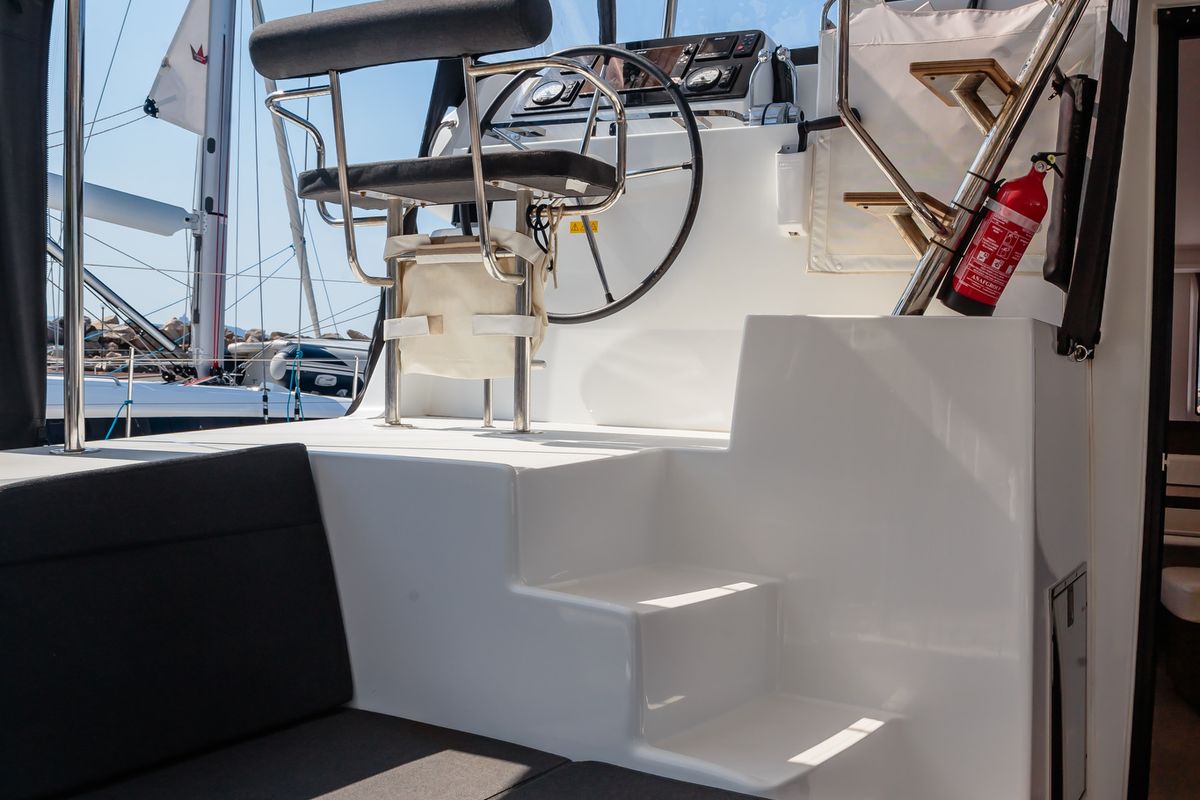 Cockpit of Brivido - Premium line , a Lagoon 42 catamaran at Capo d'Orlando, Italy