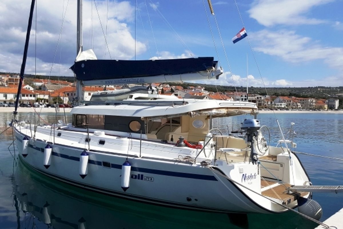 Exterior view of The Big One Two, a Dufour Atoll 6 sailboat at Primošten, Croatia