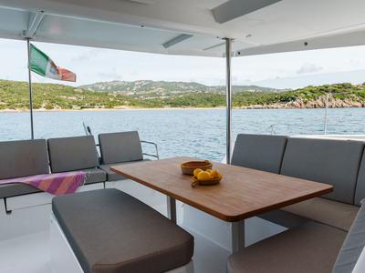 Deck of Amapola - A/C, Generator, Water maker. Solar panel, a Fountaine Pajot Astréa 42 catamaran at Cannigione, Italy
