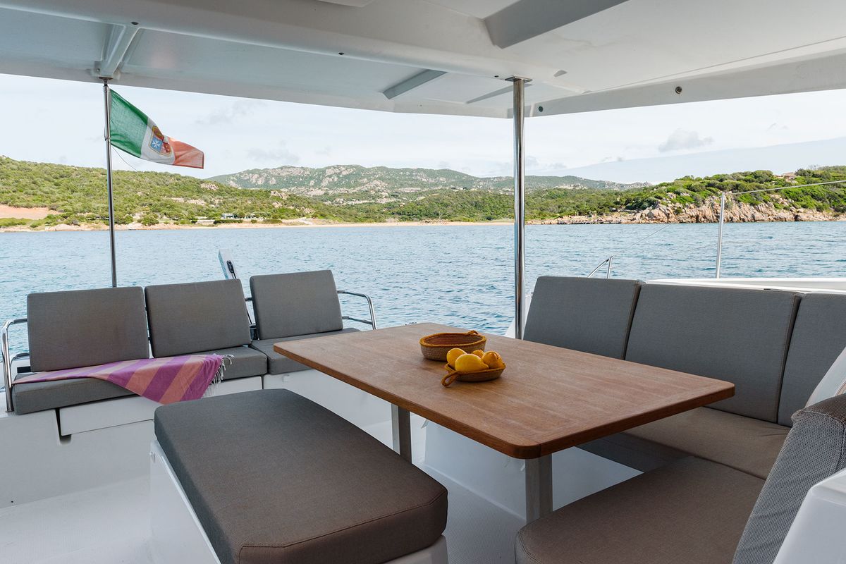 Deck of Amapola - A/C, Generator, Water maker. Solar panel, a Fountaine Pajot Astréa 42 catamaran at Cannigione, Italy