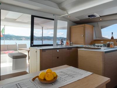 Galley of Amapola - A/C, Generator, Water maker. Solar panel, a Fountaine Pajot Astréa 42 catamaran at Cannigione, Italy
