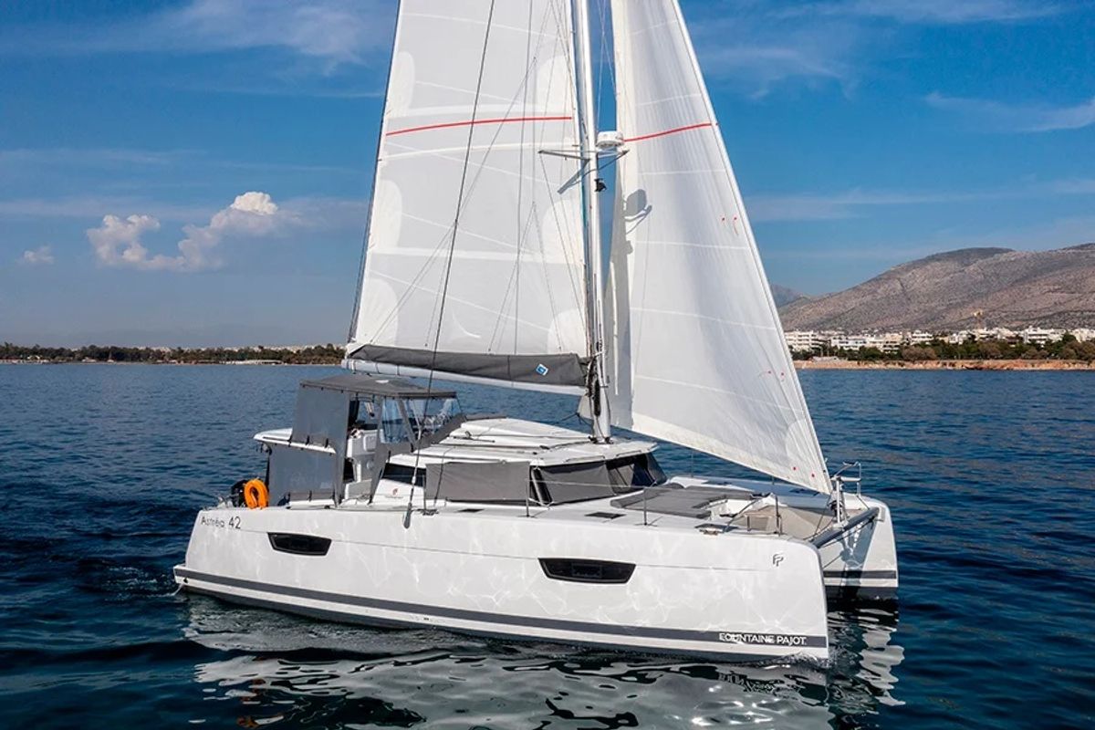 Exterior view of Nou Nou 1, a Fountaine Pajot Astréa 42 catamaran at Lavreotiki Municipal Unit, Greece