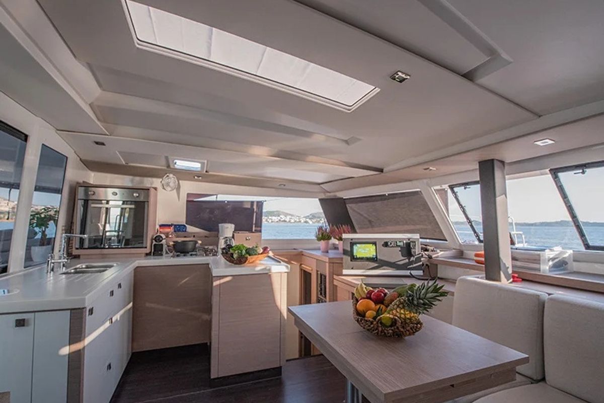 Salon of Nou Nou 1, a Fountaine Pajot Astréa 42 catamaran at Lavreotiki Municipal Unit, Greece