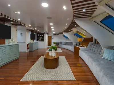 Salon of Ocean Spray, a Gulet Power Catamaran catamaran at Baltra, Ecuador