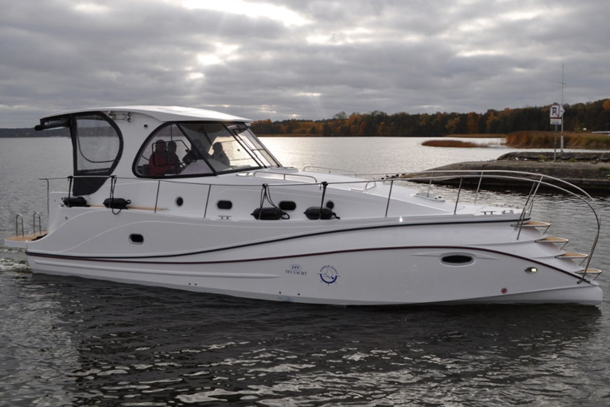 Exterior view of Tes 393 Illuminatus, a Tes 393 Illuminatus motorboat at Wilkasy, Poland
