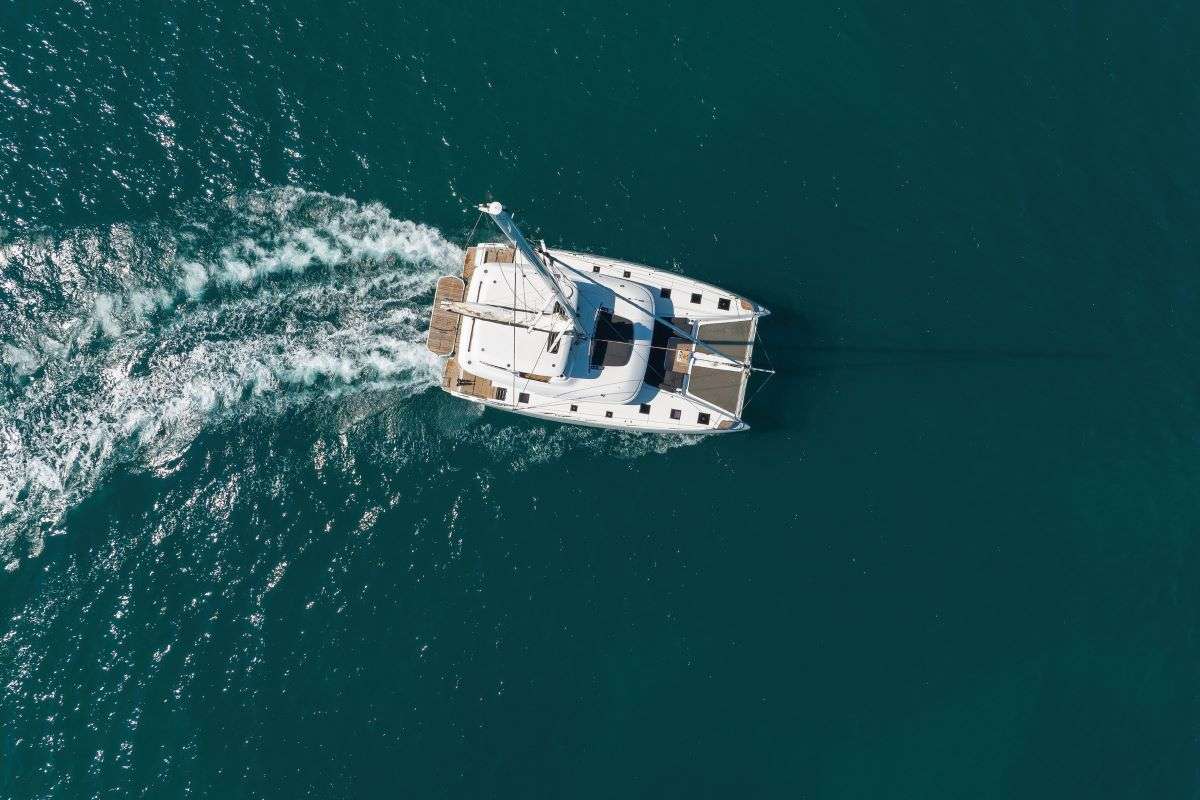 Exterior view of Champagne Please, a Lagoon 55 catamaran at Grad Kaštela, Croatia