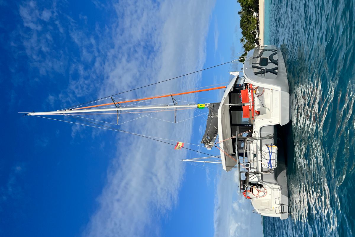 Exterior view of Yemaya Mallorca Bareboat, a Excess 11 catamaran at Port d'Andratx, Spain