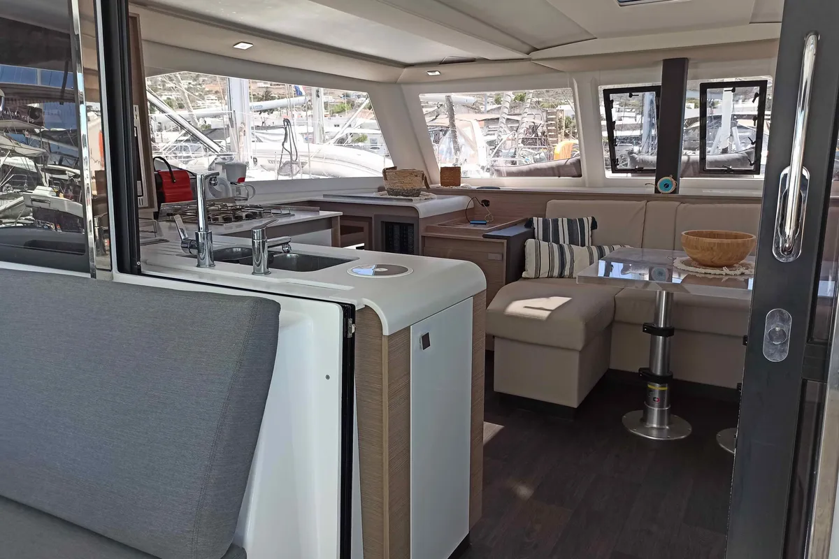 ALMIRIKI, a Fountaine Pajot Isla 40 catamaran at Parikia, Greece
