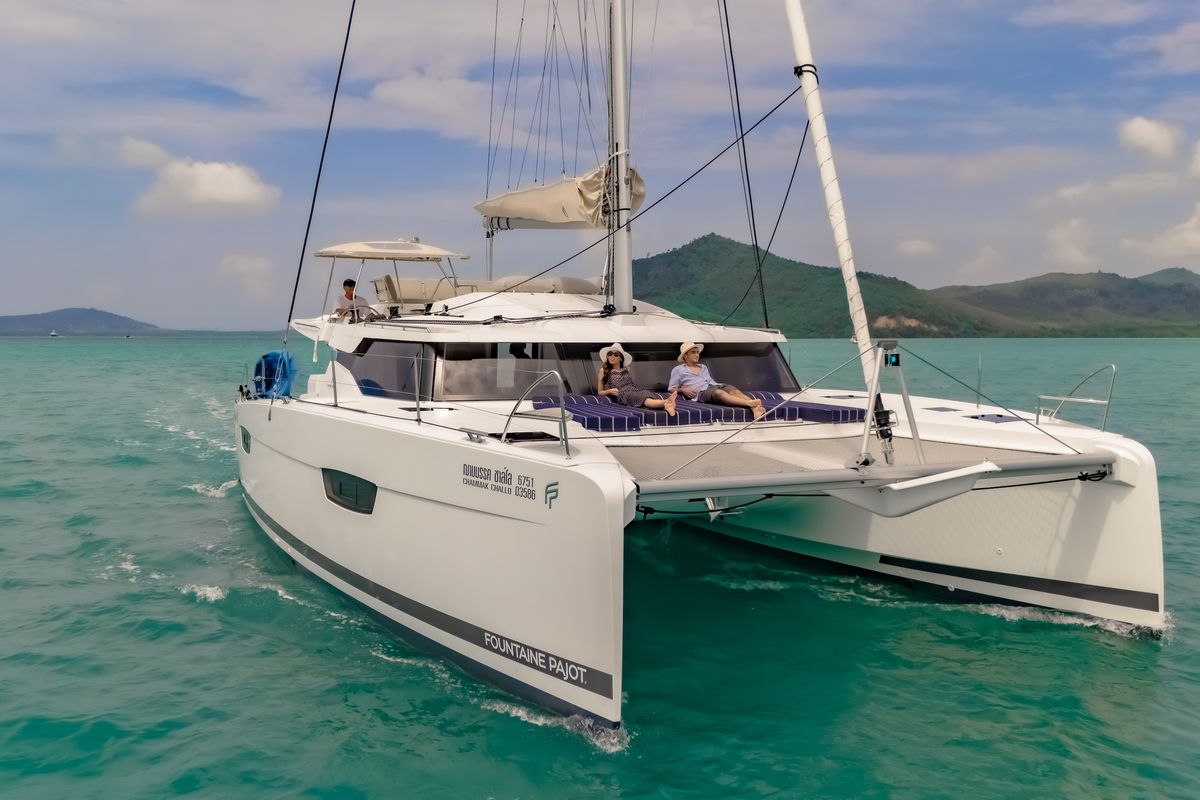 Exterior view of Chammak Challo, a Fountaine Pajot Elba 45 catamaran at Yacht Haven Marina, Thailand