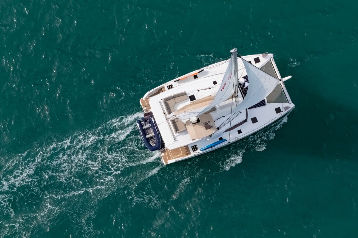 Exterior view of Chammak Challo, a Fountaine Pajot Elba 45 catamaran at Yacht Haven Marina, Thailand