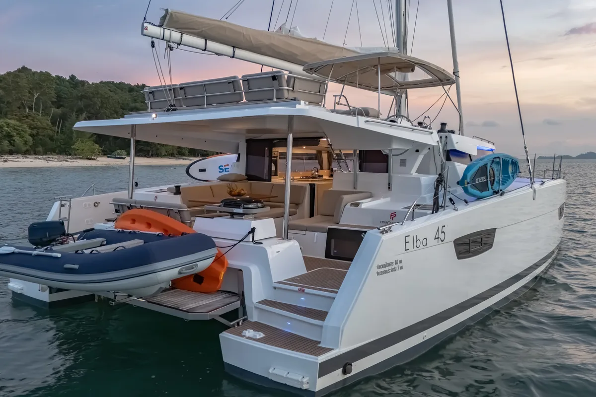 Exterior view of Chammak Challo, a Fountaine Pajot Elba 45 catamaran at Yacht Haven Marina, Thailand