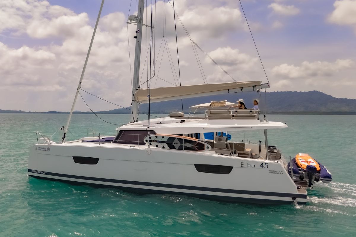 Exterior view of Chammak Challo, a Fountaine Pajot Elba 45 catamaran at Yacht Haven Marina, Thailand