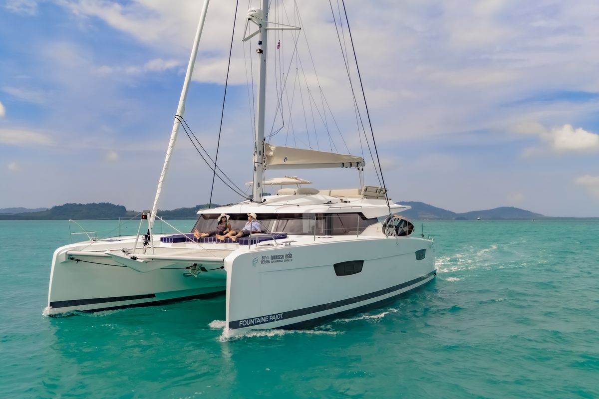 Exterior view of Chammak Challo, a Fountaine Pajot Elba 45 catamaran at Yacht Haven Marina, Thailand