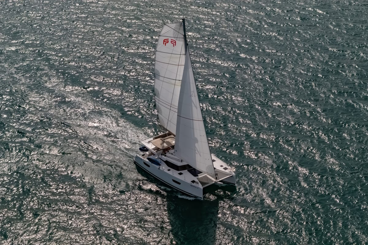 Exterior view of Chammak Challo, a Fountaine Pajot Elba 45 catamaran at Yacht Haven Marina, Thailand