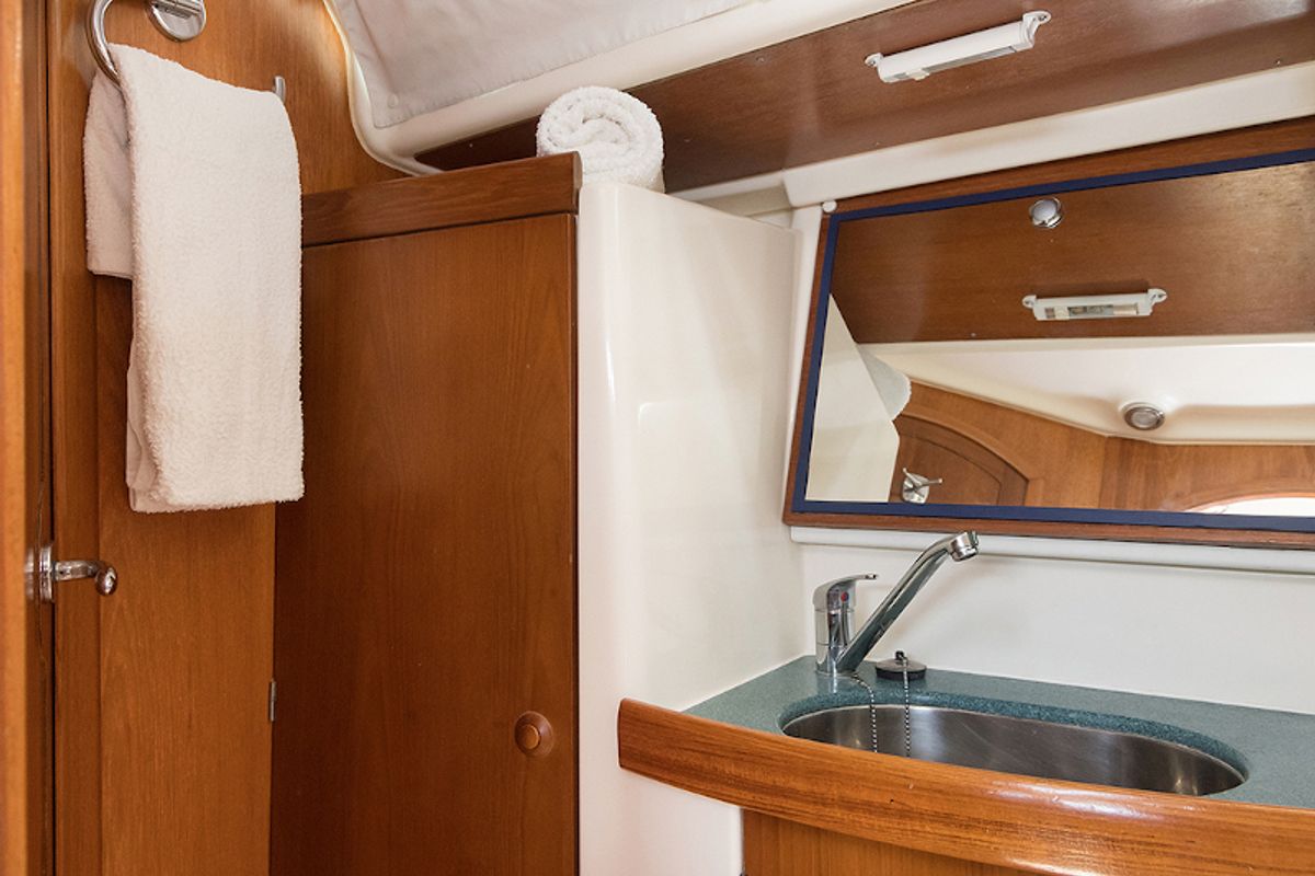 Head on Frine, a Jeanneau Sun Odyssey 43 sailboat at Naousa, Greece