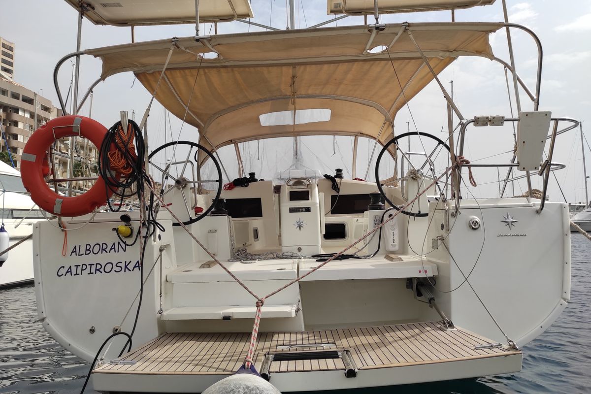 Exterior view of Alboran Caipiroska, a Jeanneau Sun Odyssey 440 sailboat at es Jonquet, Spain