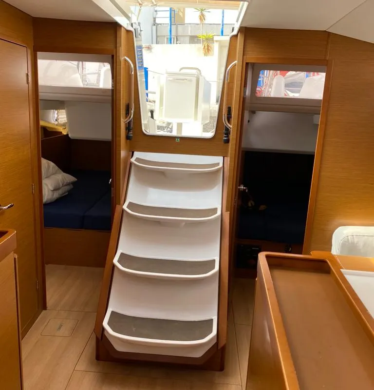 Salon of Alboran Caipiroska, a Jeanneau Sun Odyssey 440 sailboat at es Jonquet, Spain