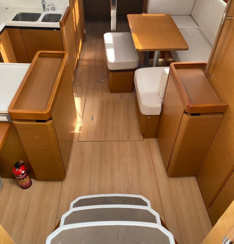 Salon of Alboran Caipiroska, a Jeanneau Sun Odyssey 440 sailboat at es Jonquet, Spain