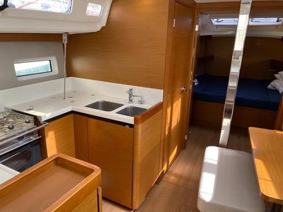 Galley of Alboran Caipiroska, a Jeanneau Sun Odyssey 440 sailboat at es Jonquet, Spain