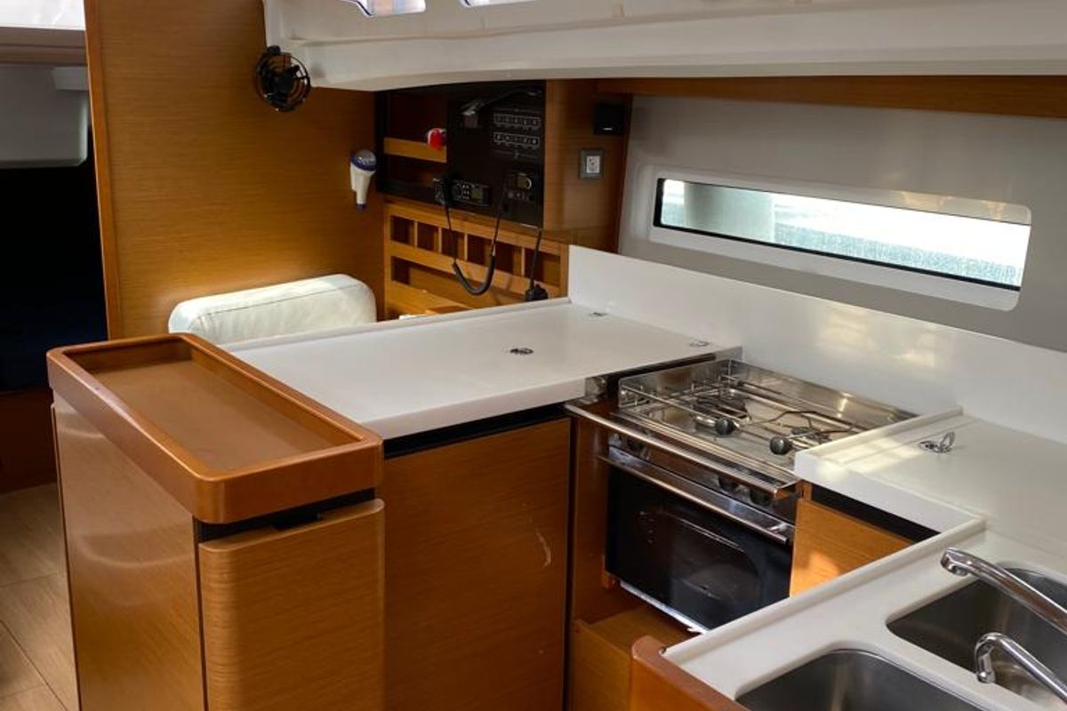Galley of Alboran Caipiroska, a Jeanneau Sun Odyssey 440 sailboat at es Jonquet, Spain