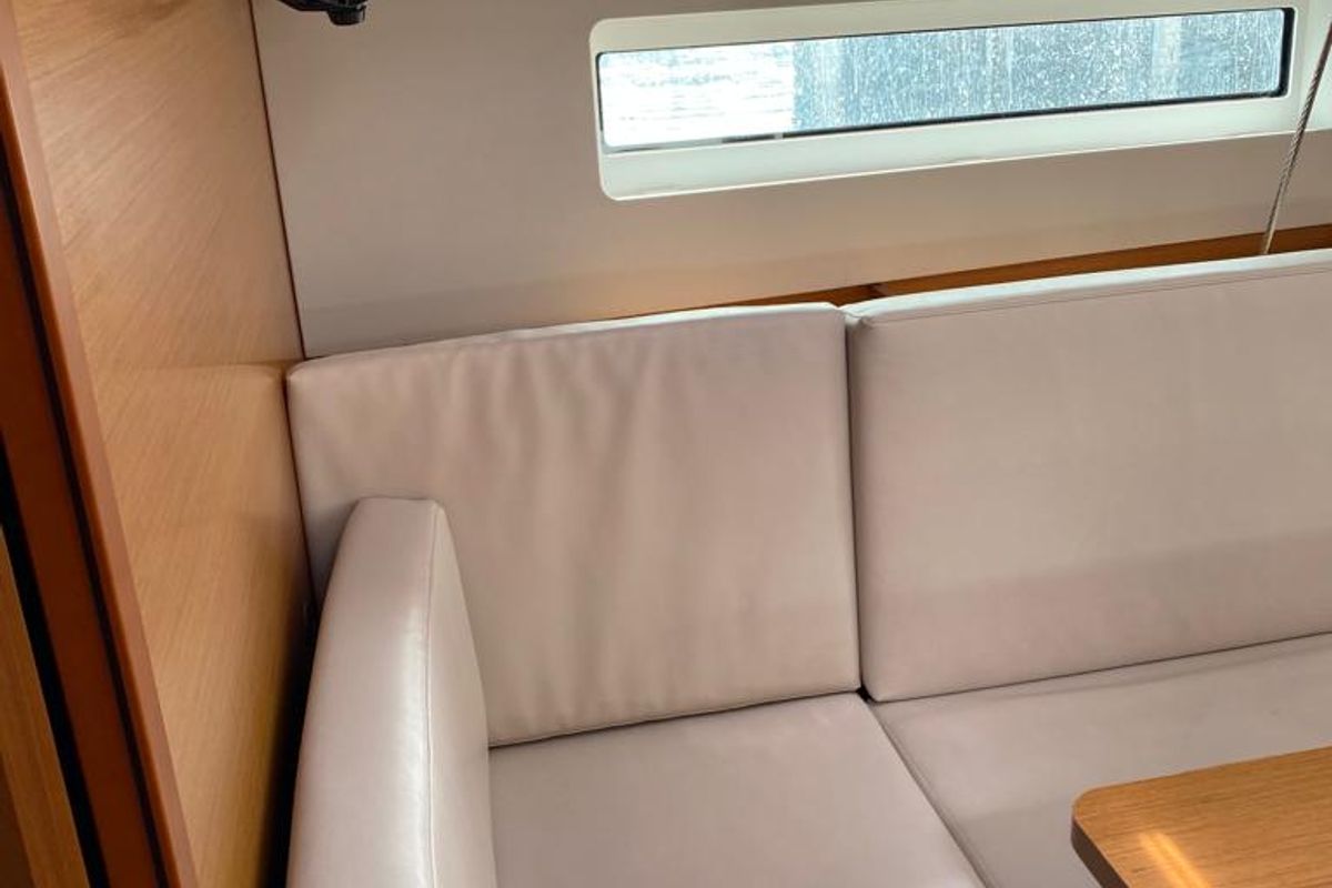 Salon of Alboran Caipiroska, a Jeanneau Sun Odyssey 440 sailboat at es Jonquet, Spain