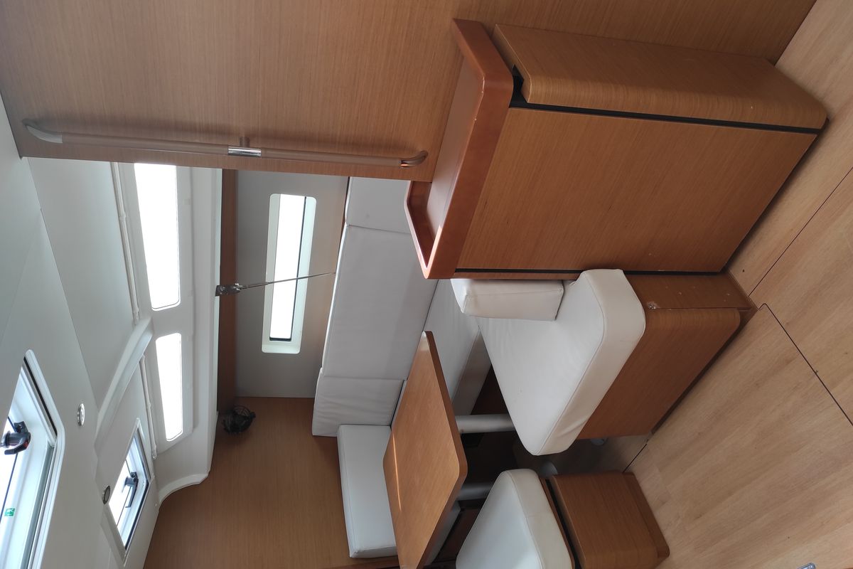 Salon of Alboran Caipiroska, a Jeanneau Sun Odyssey 440 sailboat at es Jonquet, Spain