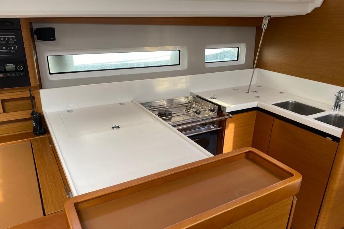 Galley of Alboran Caipiroska, a Jeanneau Sun Odyssey 440 sailboat at es Jonquet, Spain