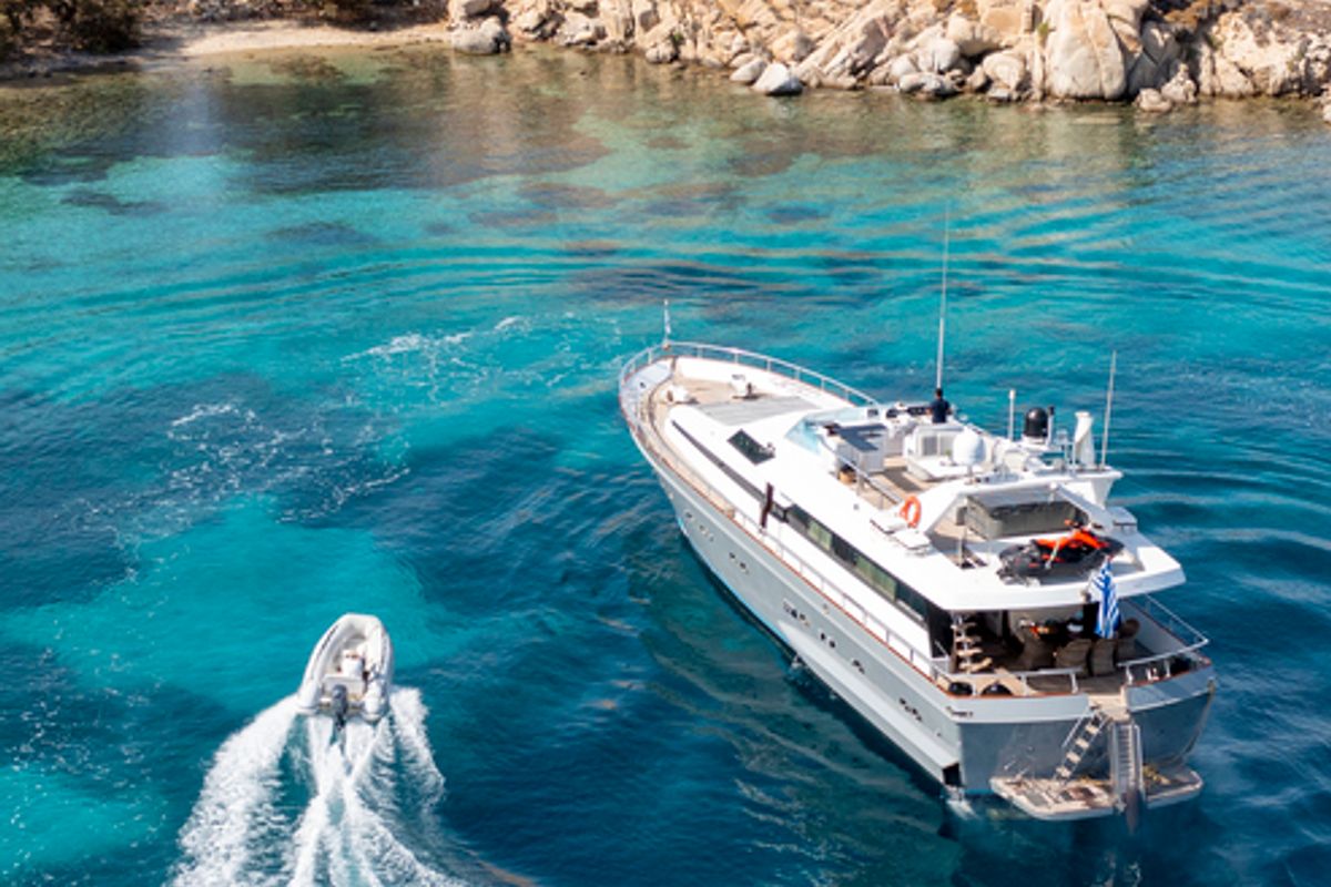 Exterior view of Shiva, a Cantieri di Pisa Akhir 27 yacht at Ornos, Greece