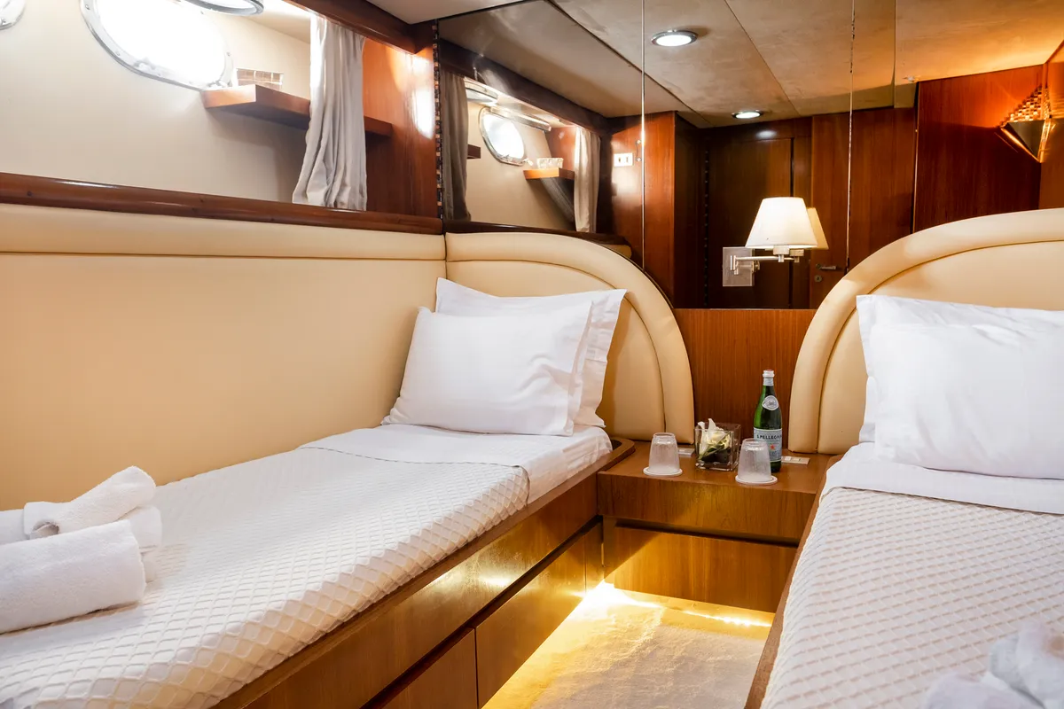 Cabin on Shiva, a Cantieri di Pisa Akhir 27 yacht at Ornos, Greece