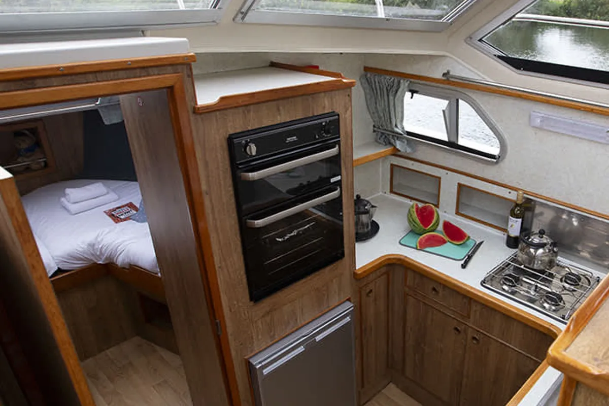 Galley of Crusader, a Cygnet Crusader motorboat at Borough of Runnymede, United Kingdom