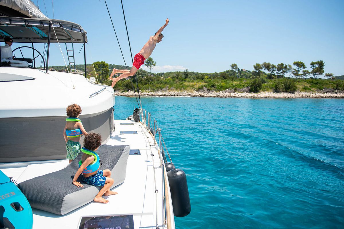 Exterior view of Serenity, a Lagoon 52 catamaran at Grad Kaštela, Croatia