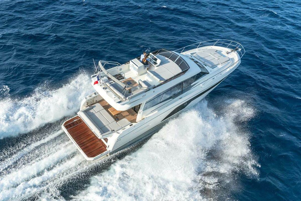 Exterior view of Dzianiny.Club 2, a Jeanneau Prestige 590 Flybridge yacht at Općina Sukošan, Croatia
