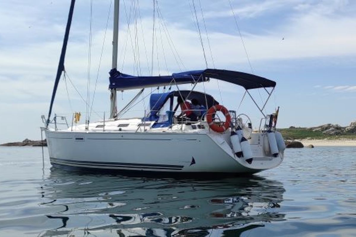 Exterior view of Machimbombo, a Dufour 385 Grand Large sailboat at Portimão, Portugal