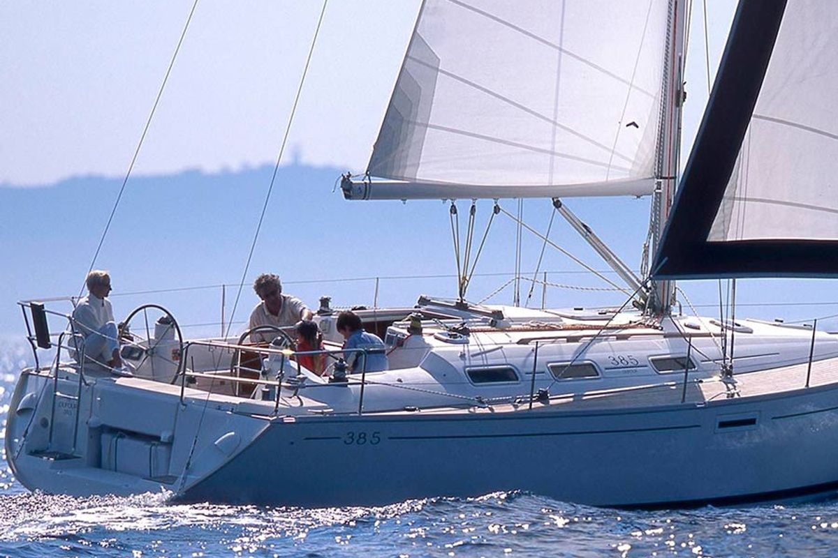 Exterior view of Machimbombo, a Dufour 385 Grand Large sailboat at Portimão, Portugal