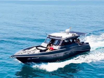 Implication, a Silvercraft Silvercraft 36HT motorboat at Rawai, Thailand