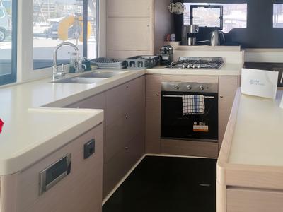 Galley of Danai, a Dufour 48 Catamaran catamaran at Agios Stefanos, Greece
