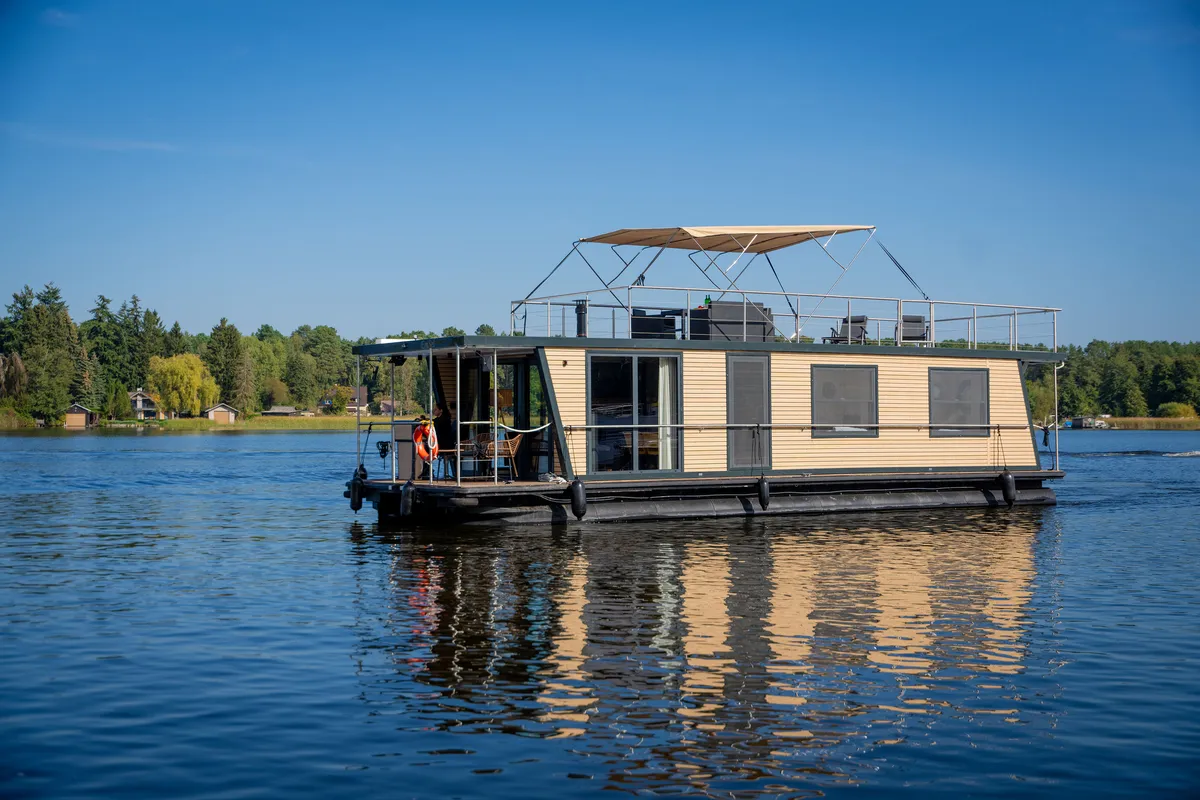 Exterior view of Ariella, a Woma D13 motorboat at Fürstenberg/Havel, Germany