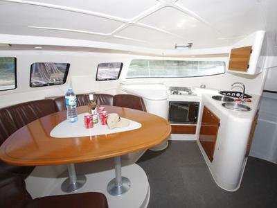 Salon of LaPerla, a Fountaine Pajot Athena 38 catamaran at Cienfuegos, Cuba