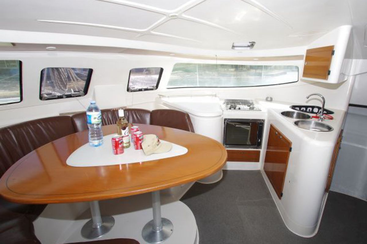 Salon of LaPerla, a Fountaine Pajot Athena 38 catamaran at Cienfuegos, Cuba