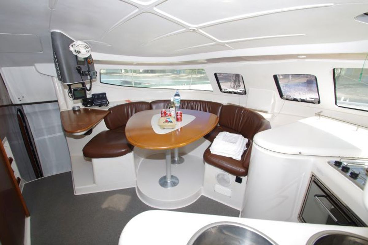 Salon of LaPerla, a Fountaine Pajot Athena 38 catamaran at Cienfuegos, Cuba