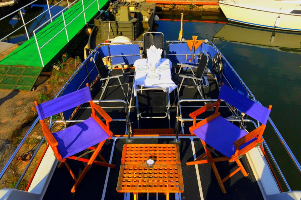 Deck of Sigrid (Electric Drive) , a Gulet Husky Dane motorboat at Motala, Sweden