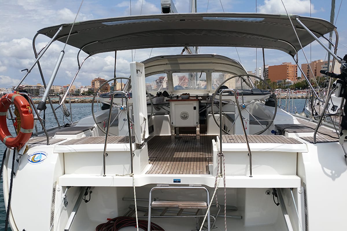 Exterior view of Maximum, a Bavaria Cruiser 56 sailboat at Llucmajor, Spain