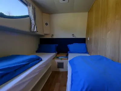 Cabin on Magnifique, a Cygnet Magnifique motorboat at Casier, Italy