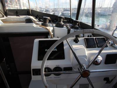 Cockpit of Sonrisa, a Fountaine Pajot Tanna 47 catamaran at Olbia, Italy