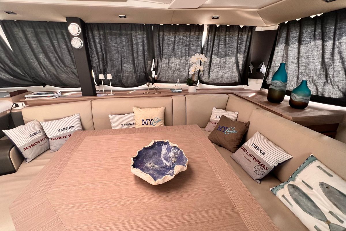 Salon of Sonrisa, a Fountaine Pajot Tanna 47 catamaran at Olbia, Italy