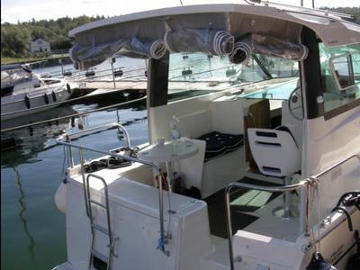 Deck of Linnea, a Delphia Yachts Delphia Escape 800 motorboat at Motala, Sweden