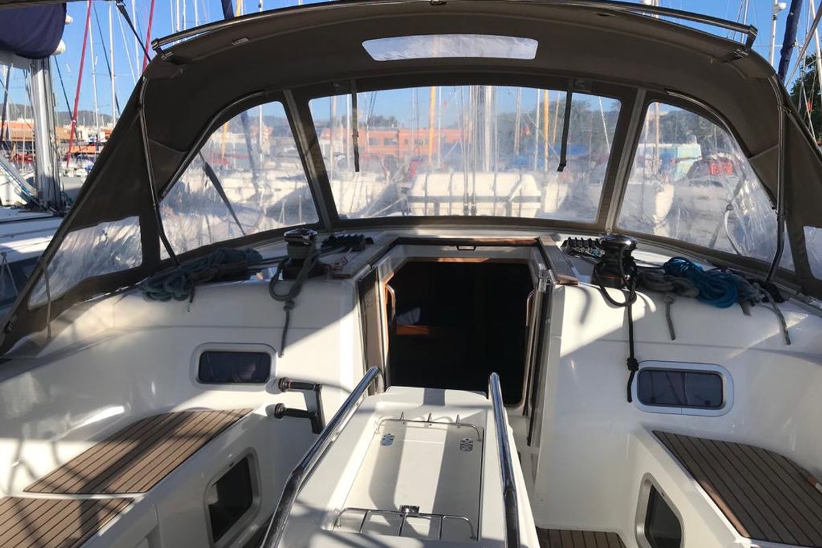 Cockpit of Alboran Bourbon, a Jeanneau Sun Odyssey 519 sailboat at es Jonquet, Spain