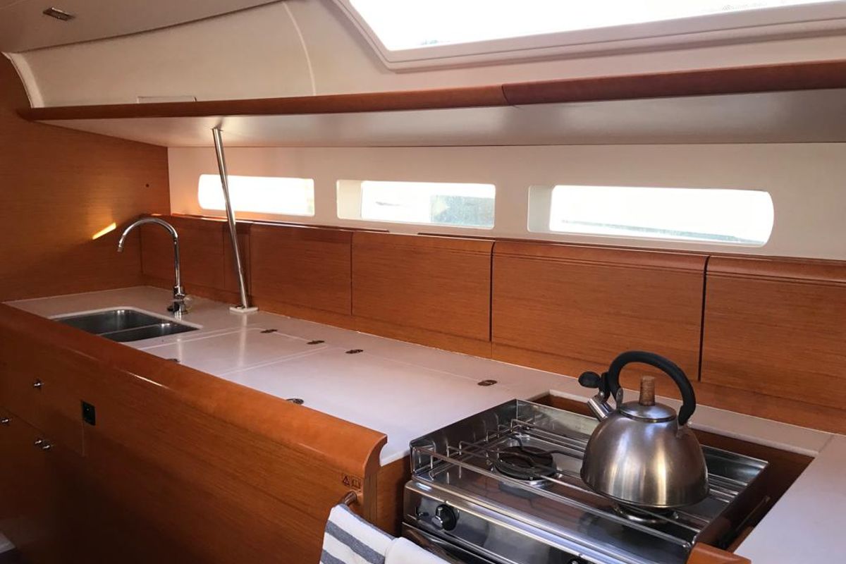 Galley of Alboran Bourbon, a Jeanneau Sun Odyssey 519 sailboat at es Jonquet, Spain