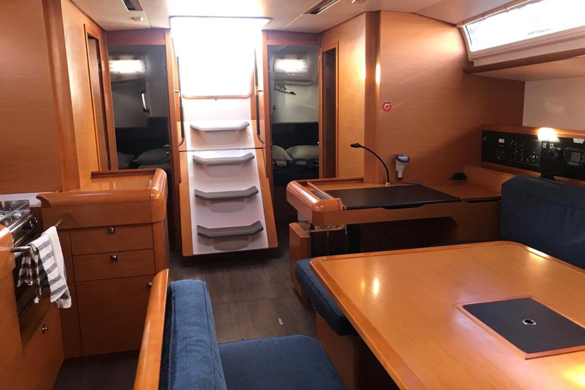 Salon of Alboran Bourbon, a Jeanneau Sun Odyssey 519 sailboat at es Jonquet, Spain
