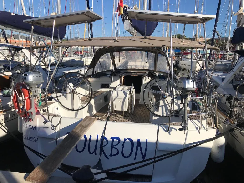 Exterior view of Alboran Bourbon, a Jeanneau Sun Odyssey 519 sailboat at es Jonquet, Spain